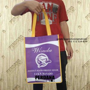 souvenir unik bahan spunbond ungu dan kuning di Manado by Perdana id4470